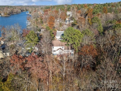 Welcome to your lakefront dream home! This newly updated on Tega Cay Golf Club in South Carolina - for sale on GolfHomes.com, golf home, golf lot