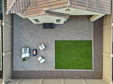 Discover your slice of paradise in this immaculate single-story on Verrado Golf Club  in Arizona - for sale on GolfHomes.com, golf home, golf lot