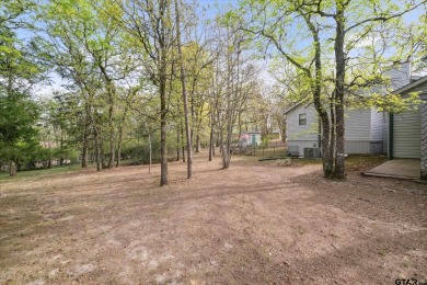 Beautifully maintained home in gated community. The cute covered on Holly Lake Ranch Golf Club in Texas - for sale on GolfHomes.com, golf home, golf lot
