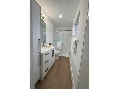 Beautifully remodeled 4-bedroom, 2-bath home located on a on Sunrise Lakes Phase III in Florida - for sale on GolfHomes.com, golf home, golf lot