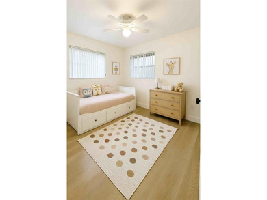 Beautifully remodeled 4-bedroom, 2-bath home located on a on Sunrise Lakes Phase III in Florida - for sale on GolfHomes.com, golf home, golf lot