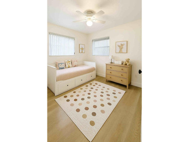 Beautifully remodeled 4-bedroom, 2-bath home located on a on Sunrise Lakes Phase III in Florida - for sale on GolfHomes.com, golf home, golf lot