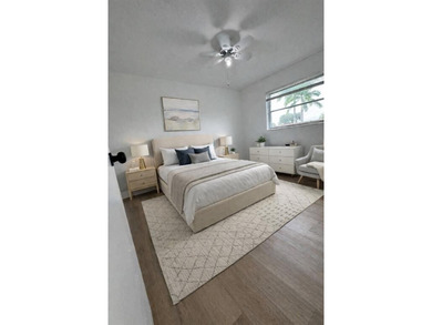 Beautifully remodeled 4-bedroom, 2-bath home located on a on Sunrise Lakes Phase III in Florida - for sale on GolfHomes.com, golf home, golf lot