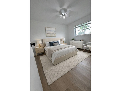 Beautifully remodeled 4-bedroom, 2-bath home located on a on Sunrise Lakes Phase III in Florida - for sale on GolfHomes.com, golf home, golf lot