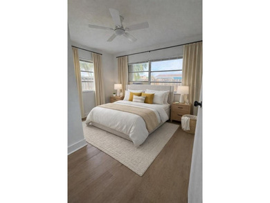 Beautifully remodeled 4-bedroom, 2-bath home located on a on Sunrise Lakes Phase III in Florida - for sale on GolfHomes.com, golf home, golf lot