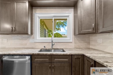Discover this thoughtfully remodeled stand-alone Timberline on Clearbrook Golf Club in New Jersey - for sale on GolfHomes.com, golf home, golf lot
