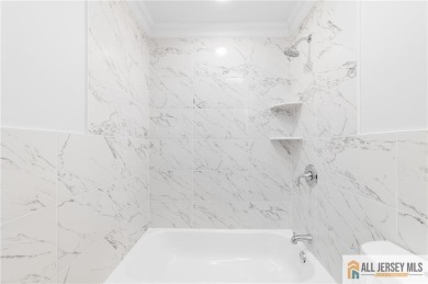 Discover this thoughtfully remodeled stand-alone Timberline on Clearbrook Golf Club in New Jersey - for sale on GolfHomes.com, golf home, golf lot