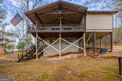 Nestled discreetly amid the pines, 9 Golf Drive, a corner lot on Rabun Golf Club in Georgia - for sale on GolfHomes.com, golf home, golf lot