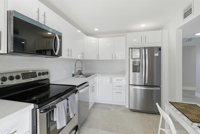 Third floor 2/2 Condo with a beautiful lake view. Totally on Palm-Aire Country Club and Resort - Palms in Florida - for sale on GolfHomes.com, golf home, golf lot