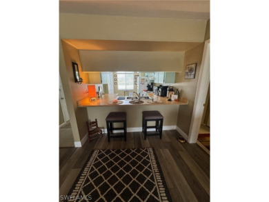 ATTENTION INVESTORS! This lovely 2nd floor, end-unit condo is on El Rio Golf Course and Club in Florida - for sale on GolfHomes.com, golf home, golf lot