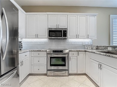 This Osprey home in HERONS GLEN COUNTRY CLUB showcases the on Herons Glen Golf and Country Club in Florida - for sale on GolfHomes.com, golf home, golf lot