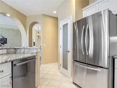 This Osprey home in HERONS GLEN COUNTRY CLUB showcases the on Herons Glen Golf and Country Club in Florida - for sale on GolfHomes.com, golf home, golf lot