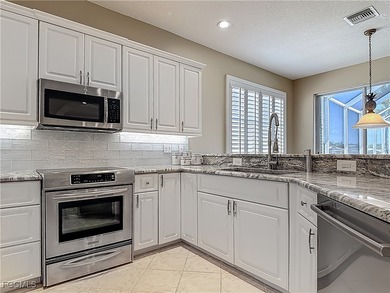 This Osprey home in HERONS GLEN COUNTRY CLUB showcases the on Herons Glen Golf and Country Club in Florida - for sale on GolfHomes.com, golf home, golf lot