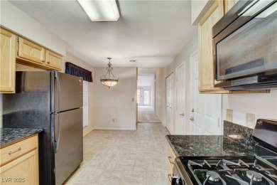 Welcome to this charming 3-bedroom townhome nestled in the on Los Prados Golf Course in Nevada - for sale on GolfHomes.com, golf home, golf lot