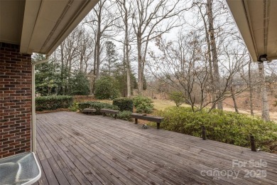 You'll love this full brick home in an amazing location on the on Cramer Mountain Country Club in North Carolina - for sale on GolfHomes.com, golf home, golf lot