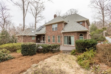 You'll love this full brick home in an amazing location on the on Cramer Mountain Country Club in North Carolina - for sale on GolfHomes.com, golf home, golf lot