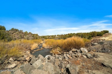 Nestled in the scenic White Mountains of Arizona, this almost on Silver Creek Golf Club in Arizona - for sale on GolfHomes.com, golf home, golf lot