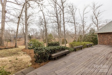 You'll love this full brick home in an amazing location on the on Cramer Mountain Country Club in North Carolina - for sale on GolfHomes.com, golf home, golf lot