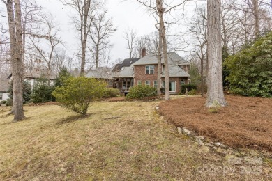 You'll love this full brick home in an amazing location on the on Cramer Mountain Country Club in North Carolina - for sale on GolfHomes.com, golf home, golf lot