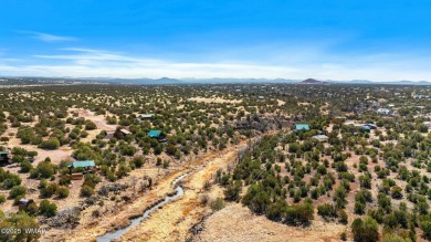 Nestled in the scenic White Mountains of Arizona, this almost on Silver Creek Golf Club in Arizona - for sale on GolfHomes.com, golf home, golf lot
