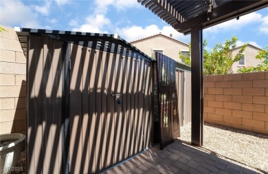Paid-off solar panels and a prime corner lot with an expansive on Rhodes Ranch Golf Club in Nevada - for sale on GolfHomes.com, golf home, golf lot