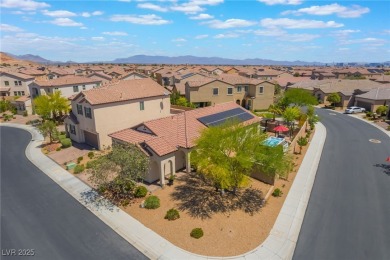 Paid-off solar panels and a prime corner lot with an expansive on Rhodes Ranch Golf Club in Nevada - for sale on GolfHomes.com, golf home, golf lot