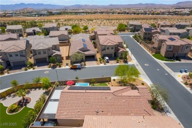 Paid-off solar panels and a prime corner lot with an expansive on Rhodes Ranch Golf Club in Nevada - for sale on GolfHomes.com, golf home, golf lot