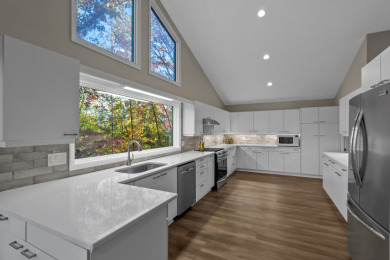 Inviting, Open Living with Lake Keowee & Blue Ridge Mountain View on Keowee Key Golf and Country Club in South Carolina - for sale on GolfHomes.com, golf home, golf lot