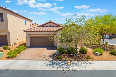 Paid-off solar panels and a prime corner lot with an expansive on Rhodes Ranch Golf Club in Nevada - for sale on GolfHomes.com, golf home, golf lot