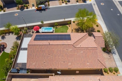 Paid-off solar panels and a prime corner lot with an expansive on Rhodes Ranch Golf Club in Nevada - for sale on GolfHomes.com, golf home, golf lot