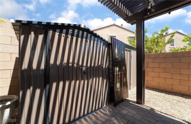 Paid-off solar panels and a prime corner lot with an expansive on Rhodes Ranch Golf Club in Nevada - for sale on GolfHomes.com, golf home, golf lot