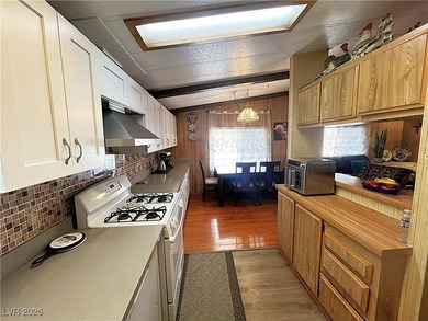 Welcome to your dreamy retreat in a vibrant 55+ community! This on Royal Links Golf Club in Nevada - for sale on GolfHomes.com, golf home, golf lot