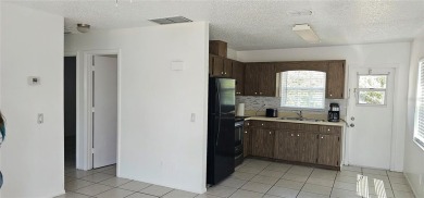 INVESTOR OPPORTUNITY! Duplex for sale. Great location nestled on Duffys Golf Center in Florida - for sale on GolfHomes.com, golf home, golf lot