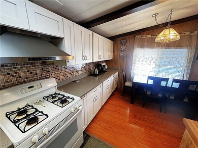 Welcome to your dreamy retreat in a vibrant 55+ community! This on Royal Links Golf Club in Nevada - for sale on GolfHomes.com, golf home, golf lot