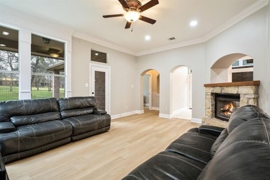 This 3-bedroom, 2.5-bath home offers a functional two-story on The Golf Club at Resort Eagle Mountain Lake in Texas - for sale on GolfHomes.com, golf home, golf lot