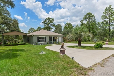 Modern Elegance Meets Outdoor Beauty - 2023 Contemporary 4/2 in on Pine Ridge Community Golf and Country Club in Florida - for sale on GolfHomes.com, golf home, golf lot