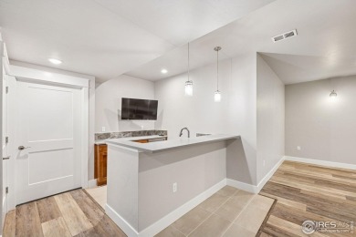 Welcome to this one-of-a-kind upgraded patio home in Water on Pelican Lakes Golf and Country Club in Colorado - for sale on GolfHomes.com, golf home, golf lot