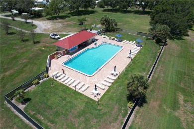 COME HOME TO BAREFOOT BAY....2 bedrooms, 2 bath beautiful home on Barefoot Bay Golf Course in Florida - for sale on GolfHomes.com, golf home, golf lot