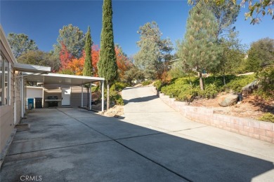 Cute, clean and affordable manufactured home that backs up to on Lake Oroville Golf and Event Center in California - for sale on GolfHomes.com, golf home, golf lot