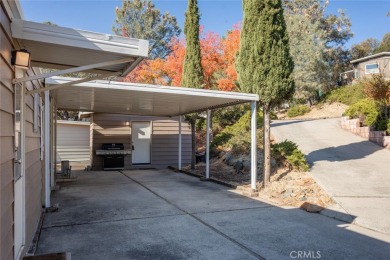 Cute, clean and affordable manufactured home that backs up to on Lake Oroville Golf and Event Center in California - for sale on GolfHomes.com, golf home, golf lot