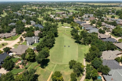 BEAUTIFUL custom home on the 12th fairway of amazing Oak Tree on Oak Tree National Golf and Country Club in Oklahoma - for sale on GolfHomes.com, golf home, golf lot