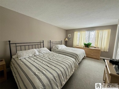 Located at the highly sought-after Peak 'n Peak Resort, this on Peek n Peak Golf Course - Upper  in New York - for sale on GolfHomes.com, golf home, golf lot