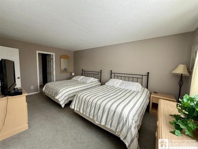 Located at the highly sought-after Peak 'n Peak Resort, this on Peek n Peak Golf Course - Upper  in New York - for sale on GolfHomes.com, golf home, golf lot