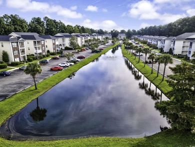 Welcome to this relaxing second floor one bedroom one bath end on River Oaks Golf Plantation  in South Carolina - for sale on GolfHomes.com, golf home, golf lot