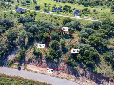 Build your lakeside retreat on this elevated 0.3-acre lot within on Hideout Golf Club and Resort  in Texas - for sale on GolfHomes.com, golf home, golf lot