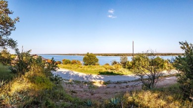 Build your lakeside retreat on this elevated 0.3-acre lot within on Hideout Golf Club and Resort  in Texas - for sale on GolfHomes.com, golf home, golf lot