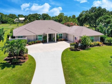 Welcome to this breathtaking 4BR, 3 updated baths, 2 car garage on Evergreen Club in Florida - for sale on GolfHomes.com, golf home, golf lot