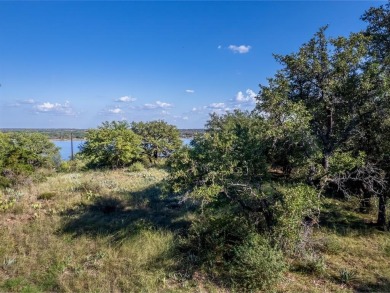 Build your lakeside retreat on this elevated 0.3-acre lot within on Hideout Golf Club and Resort  in Texas - for sale on GolfHomes.com, golf home, golf lot