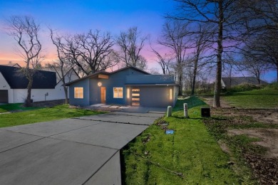 Nestled between Cedar Creek Country Club (golf packages on Cedar Creek Country Club in Texas - for sale on GolfHomes.com, golf home, golf lot