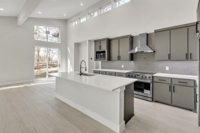Nestled between Cedar Creek Country Club (golf packages on Cedar Creek Country Club in Texas - for sale on GolfHomes.com, golf home, golf lot